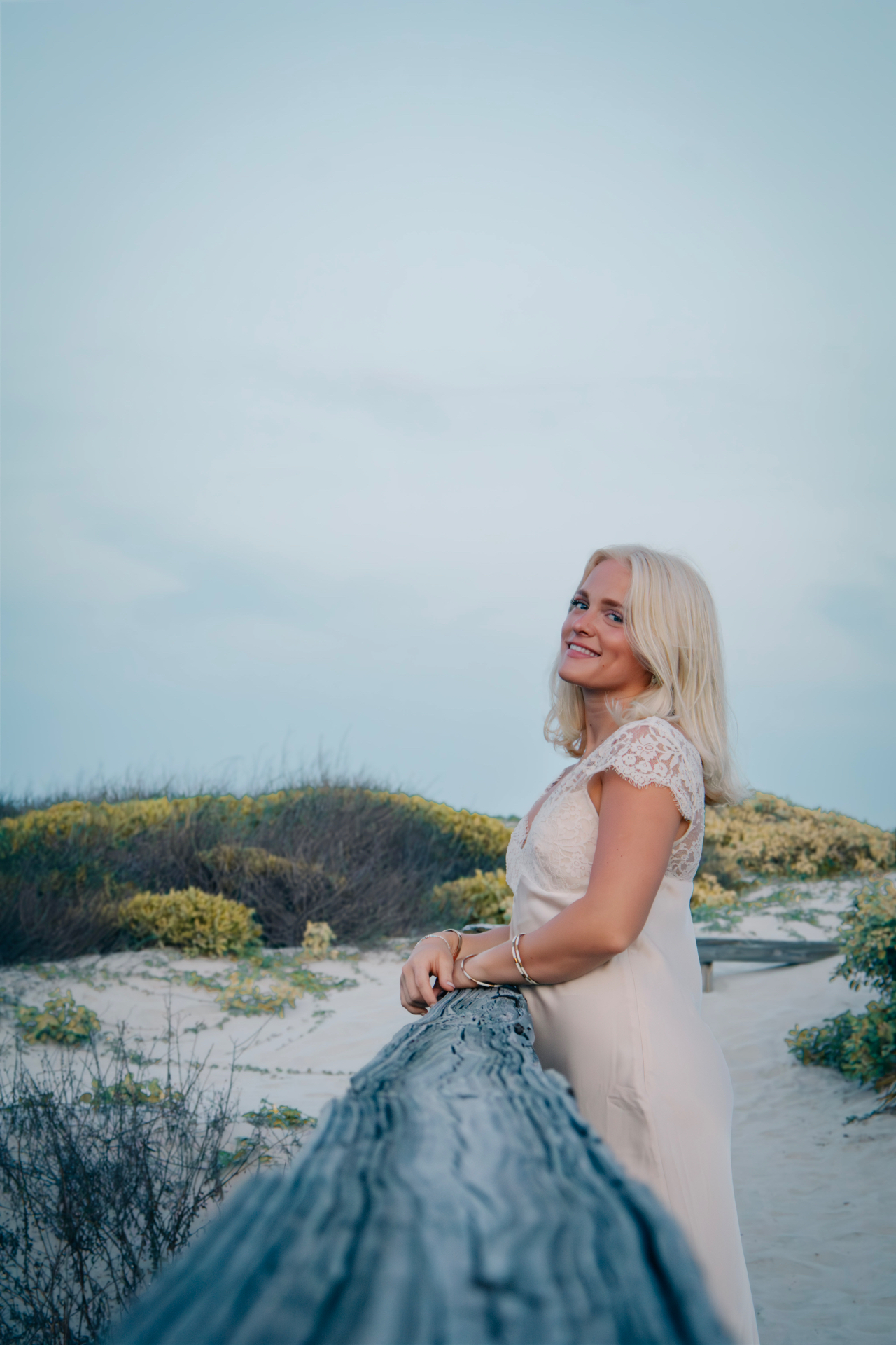 Senior smiling at the dune trail