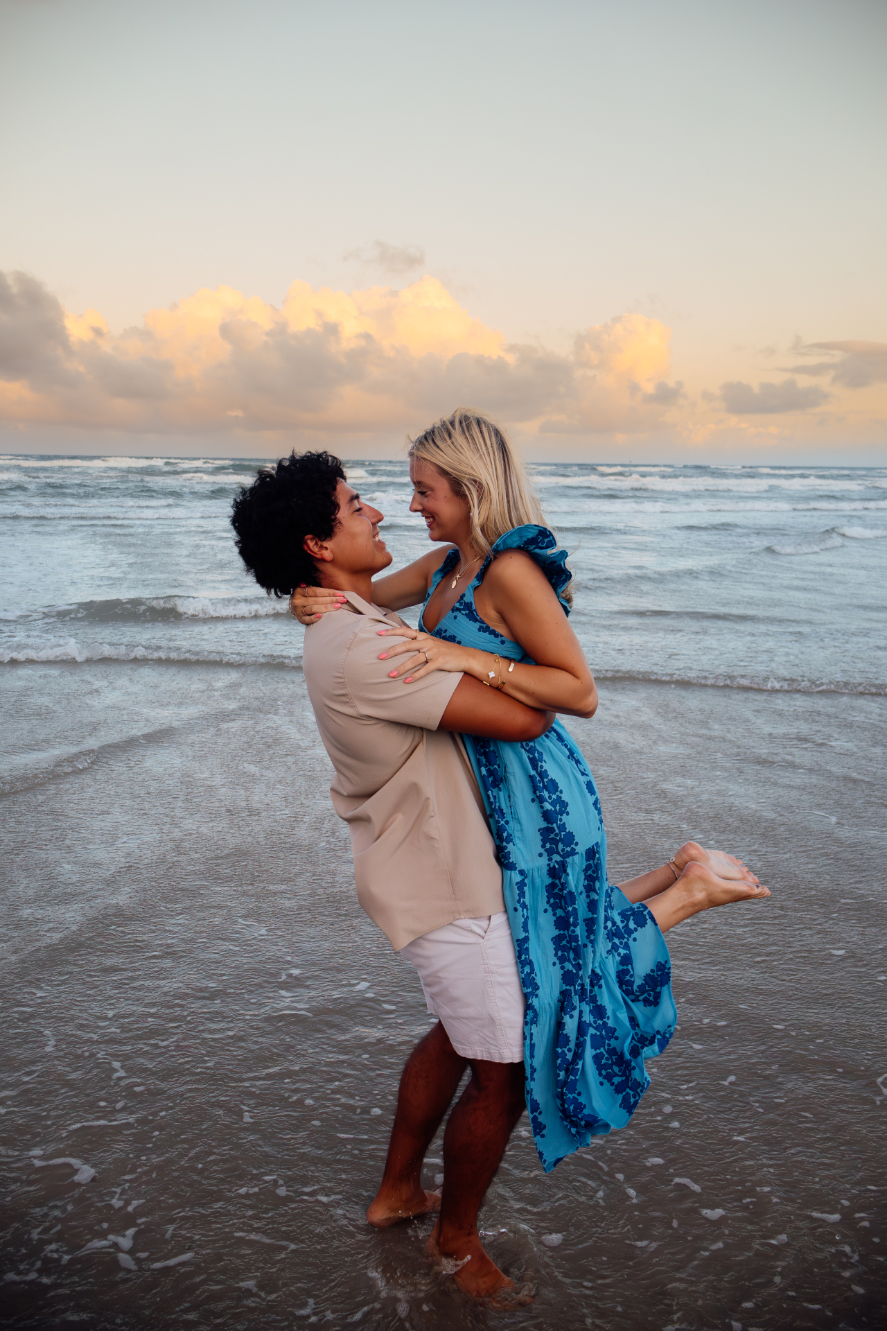 Couple lifted at the shoreline